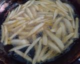 A picture of step 4 of Dynamite cheese loaded fries.