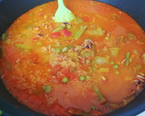 Foto del paso 2 de la receta: Paella de marisco con piquillos y hierbabuena