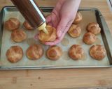 Foto del passaggio 11 della ricetta Bignè con crema al caffè e cioccolato