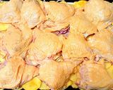 A picture of step 2 of Chicken with potatoes in the oven.
