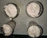 A picture of step 3 of White chocolate choco bar nuties.
