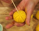 A picture of step 9 of Pumpkin Mochi.