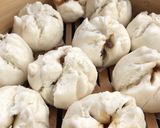 A picture of step 6 of Cracked Top Steamed Buns with Grilled Pork Filling.