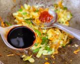 A picture of step 4 of Veg Schezwan Fried Matta Red Rice.