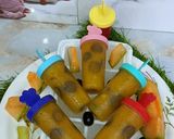 A picture of step 9 of Muskmelon Grapes Popsicles.
