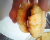 Foto del paso 5 de la receta: Alfajores con masa de coco relleno de frosting de chocolate