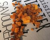 Une image de l'étape 5 de Courgettes au jambon, poivron, tomates, abricots secs et citron confit.