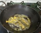 A picture of step 1 of Tengara Fish Curry.