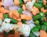 A picture of step 2 of Mix Veg Upma.