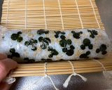 A picture of step 6 of Mickey Mouse Roll Sushi.