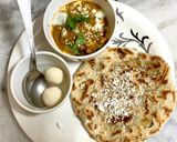 A picture of step 9 of Stuffed paratha and butter masala paneer.