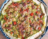 Une image de l'étape 3 de Tarte salée au pesto, tomates cerises et mozzarella.