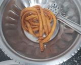 A picture of step 10 of Ribbon Pakodas.