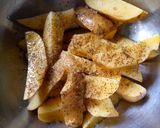 A picture of step 1 of Baked Irish Potatoes and peppered chicken.