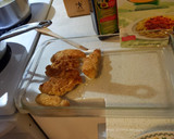 A picture of step 12 of Chicken parmesan.