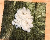A picture of step 1 of Onigirazu (Sandwich style Japanese Rice ball).