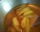 A picture of step 3 of Papaya with Pabda curry.