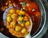 A picture of step 6 of Shahi Chhole Bhature prepared with garam masala.