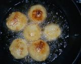 A picture of step 8 of Laddu stuffing bread puwa.
