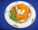 A picture of step 8 of Rice flour pancakes with frozen banana yogurt and strawberry sauce.
