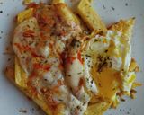 Foto del paso 5 de la receta: Huevos rotos con provolone y sobrasada al chimichurri