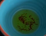 A picture of step 1 of Pappadelle Pasta with Asparagus, Saffron + Peas.