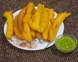 A picture of step 2 of Mirchi bhajji.