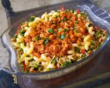A picture of step 5 of Pasta with red chicken sauce and vegetables.