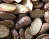 A picture of step 4 of Basil Oil Roasted Potatoes.