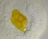 A picture of step 3 of Coconut mandazis.