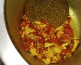 A picture of step 4 of Haldi mix veg Rice.