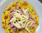 Foto del paso 3 de la receta: Arroz amarillo con rulos de jamón y queso