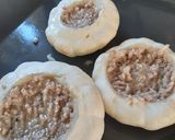 A picture of step 5 of Sausage meat stuffed patty pans.
