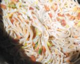 A picture of step 6 of Orange Sauce Spaghetti with chicken patty.