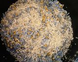 A picture of step 1 of Butterfly Pea Flower Sticky Rice with Mung Beans.
