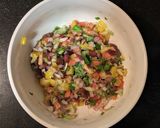 A picture of step 5 of Mexican quinoa salsa in cucumber pockets.