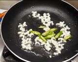 A picture of step 2 of Walnut Schezwan Stir Fry.