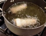 A picture of step 11 of Cheeseburger Egg rolls.