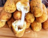 صورة لخطوة 4 من وصفة أصابع البطاطس بالموتزاريلا 🥔