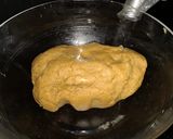 A picture of step 4 of Biscuits Meethi (Swiss roll style).
