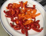 Une image de l'étape 5 de Filets d'églefin aux poivrons bicolores, ail, citron et herbes du jardin.