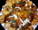 A picture of step 5 of Spicy baked potatoes and peppered chichen.