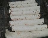 A picture of step 5 of Refried Been Enchiladas.
