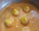 A picture of step 7 of Kolhapuri Modak Curry.