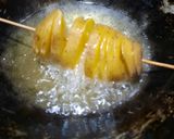 A picture of step 4 of Spiral fried potatoes.