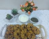 A picture of step 5 of Sabudana vada donut with sweet curd and mint chutney.