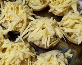 A picture of step 8 of "loaded" stuffed potato skins.