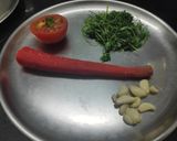 A picture of step 1 of Carrot Tomato Garlic Pickle😋.