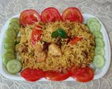 A picture of step 10 of Chicken pulao 🍗🍗🍚🍅🥒🧅.