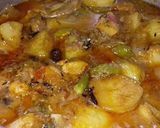 A picture of step 3 of Aalu Gosht.